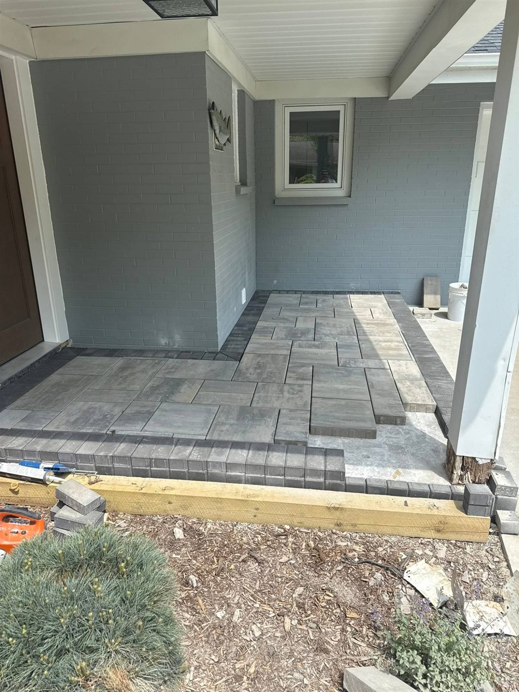 Front stoop being rebuilt with matching pavers