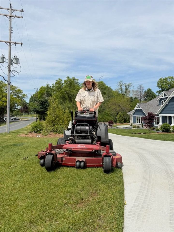 Mowing a residential lawn