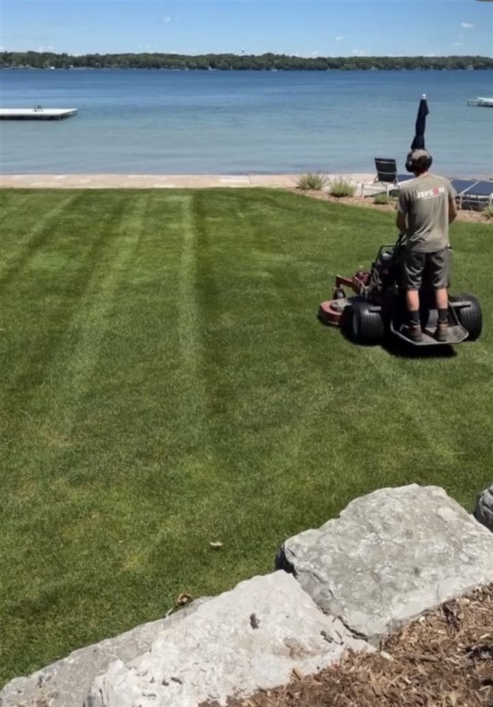 Striped lawn along the water