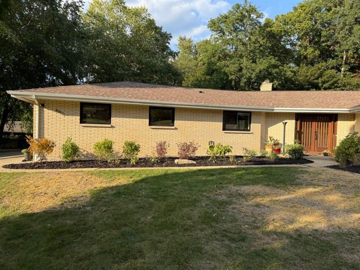 Well-maintained residential property with trimmed foundation beds