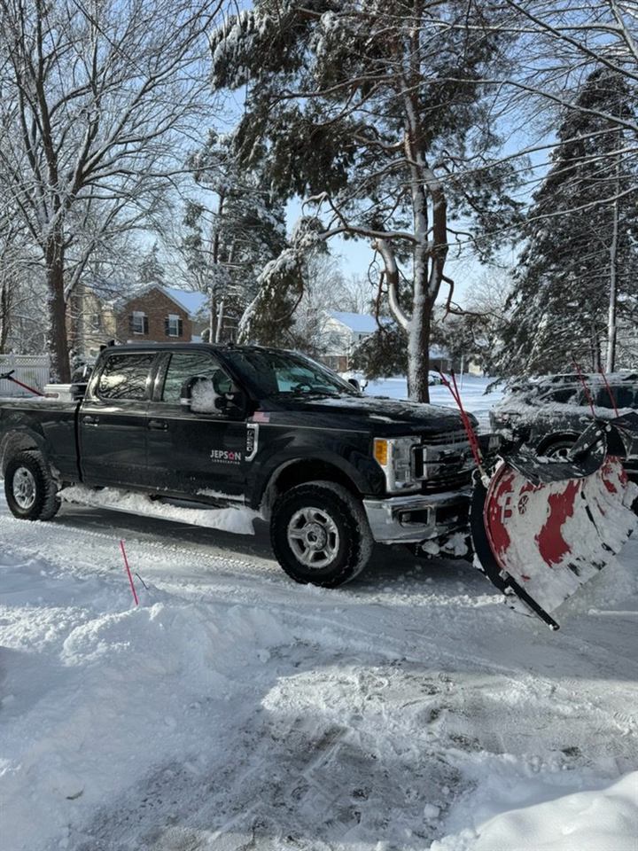 Plow truck clearing snow