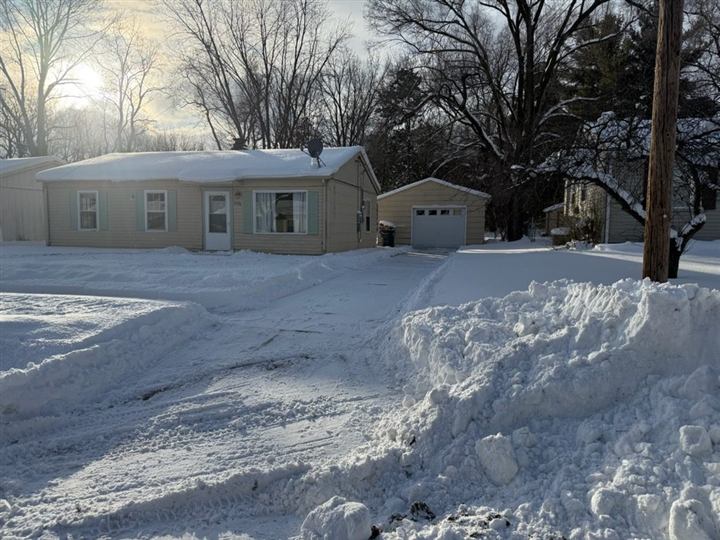 Cleared residential driveway after a storm